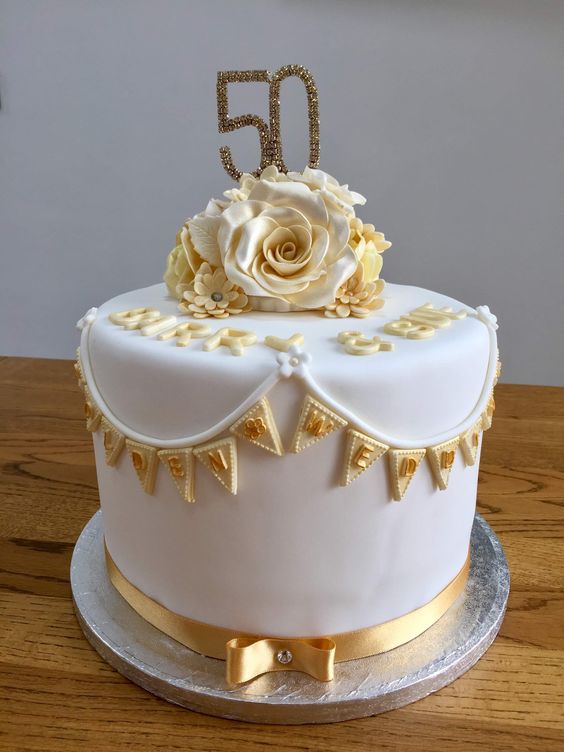 50th Birthday Cake Made this simple yet classy 50th birthday celebration  cake in gold and white with some fresh flowers and a beautiful… | Instagram