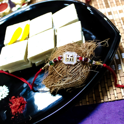 Set of 2 Fancy Rakhis with Sweet Hamper