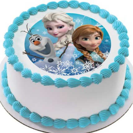 2-layer cake with lighted candles and Disney Frozen Queen Elsa cake topper  photo – Free Cake Image on Unsplash